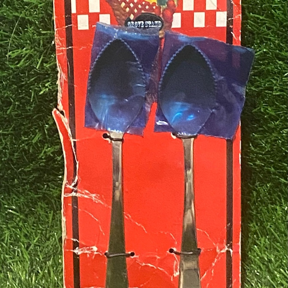Two New Grove Stand grapefruit spoons package has wear as seen in picture